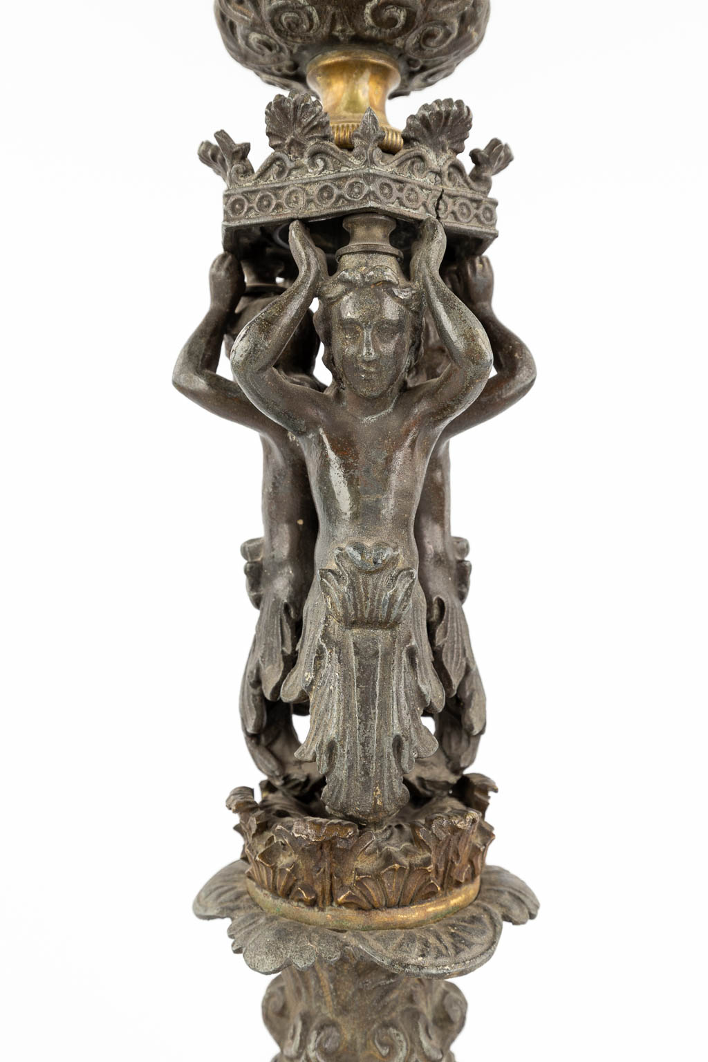 A pair of candlesticks decorated with Karyatids. Spelter and bronze. 19th C. (L:17 x W:17 x H:48 cm)