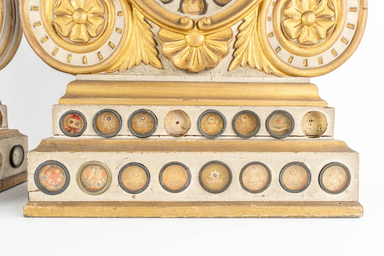 A pair of large reliquary cabinets with 95 theca, of which 65 have documents. Neoclassical style, 19th C.