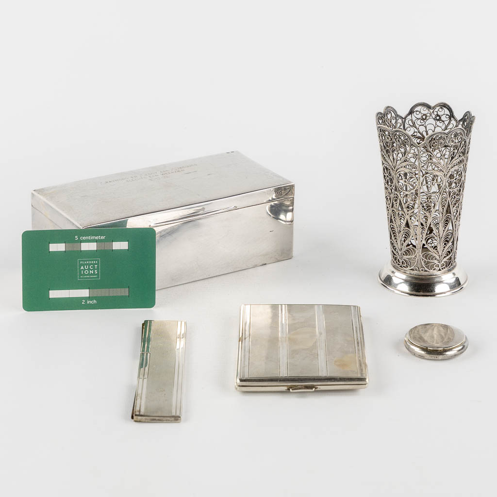 Wolfers, a silver jewellery or Cigar box, added are some silver objects. (L:8 x W:16 x H:6 cm)