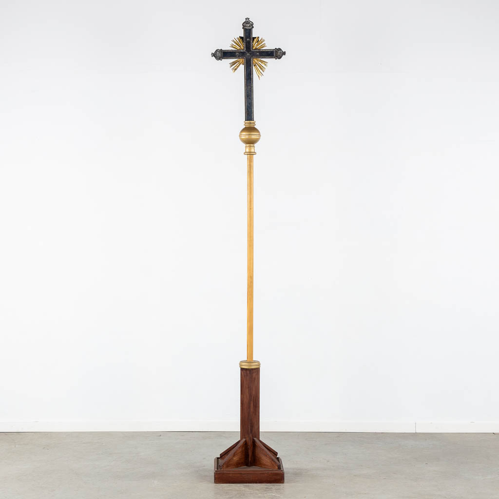 Four Processional crucifixes with their stands. Silver-plated metal and Brass. (H:265 cm)