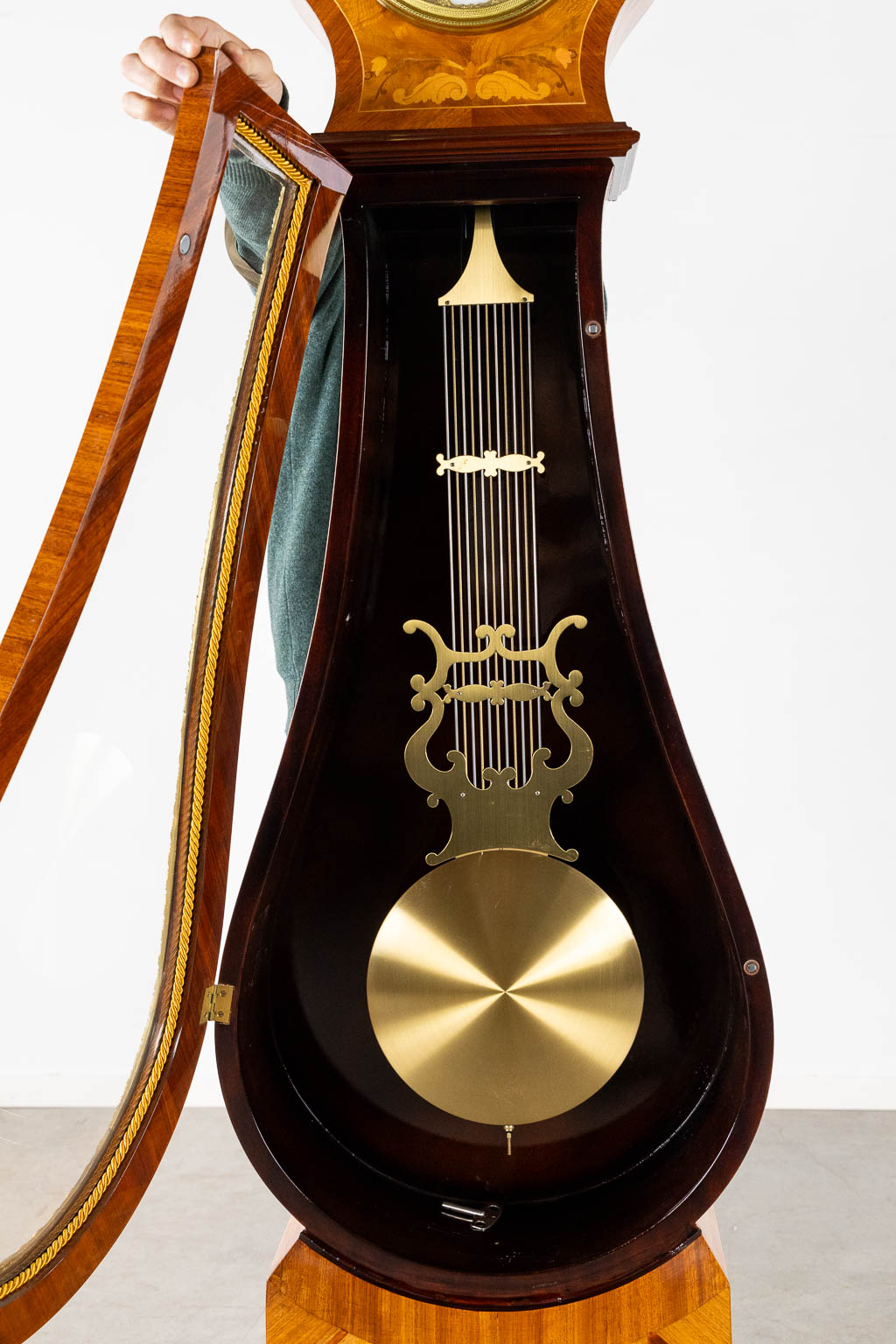 A large marquetry inlay Grandfather clock, mounted with bronze. Circa 1970. (L:32 x W:61 x H:220 cm)