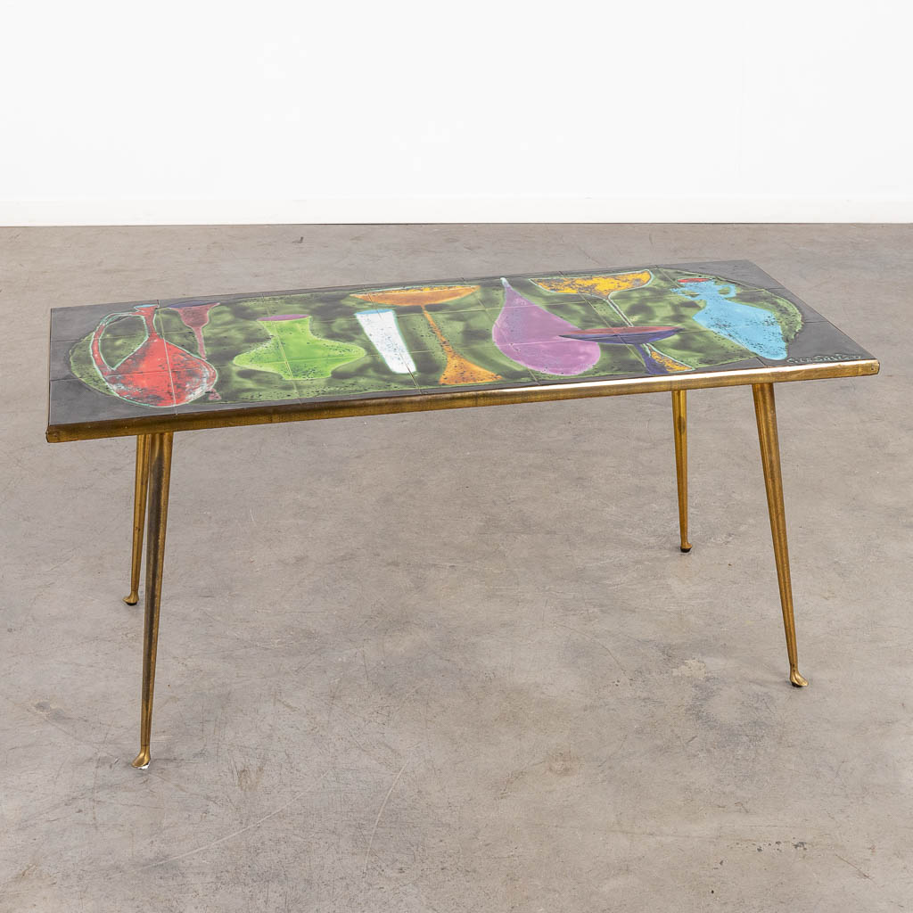 A mid-century coffee table with ceramic tile top, signed 'C. Le Savigny'. (D:47 x W:109 x H:48 cm)