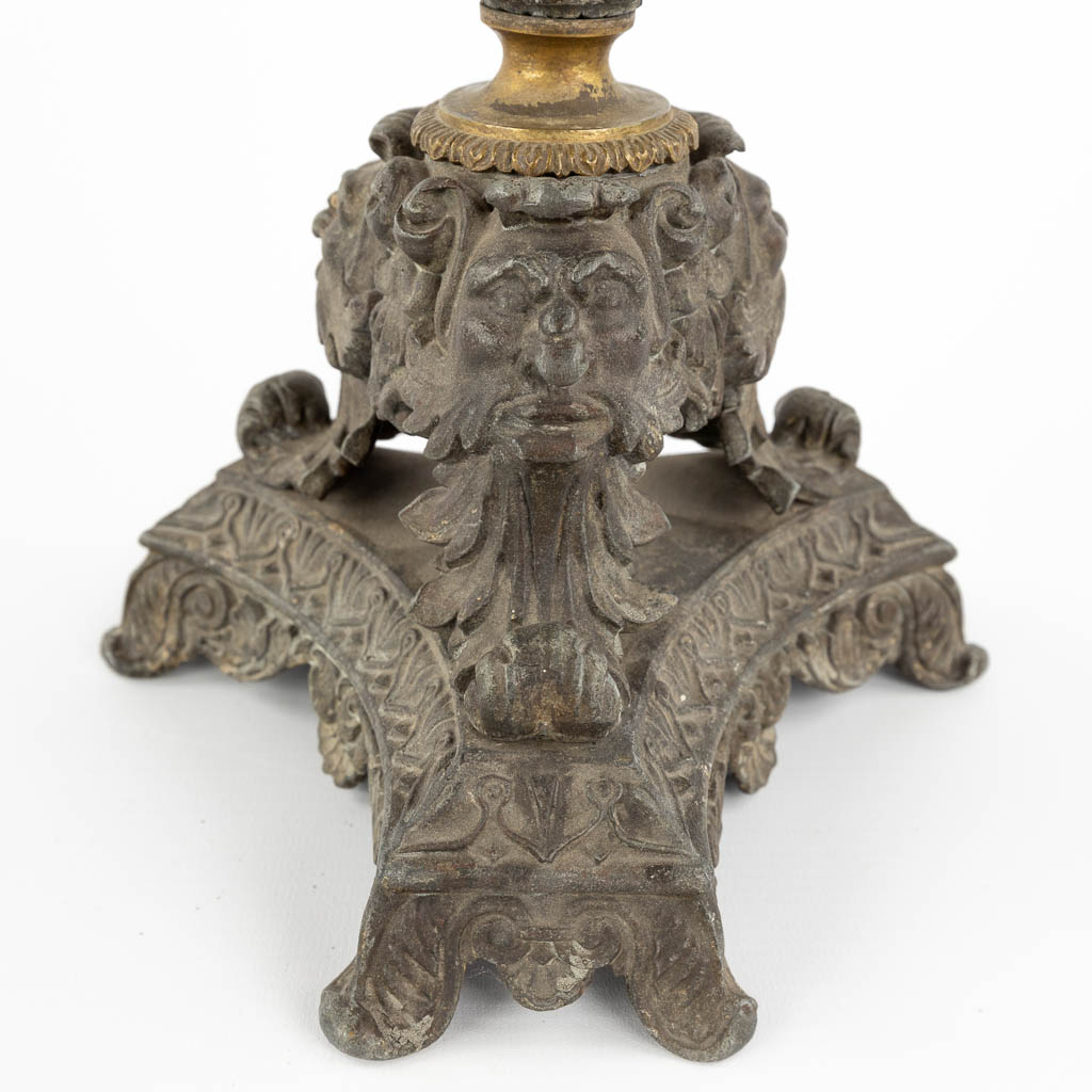 A pair of candlesticks decorated with Karyatids. Spelter and bronze. 19th C. (L:17 x W:17 x H:48 cm)