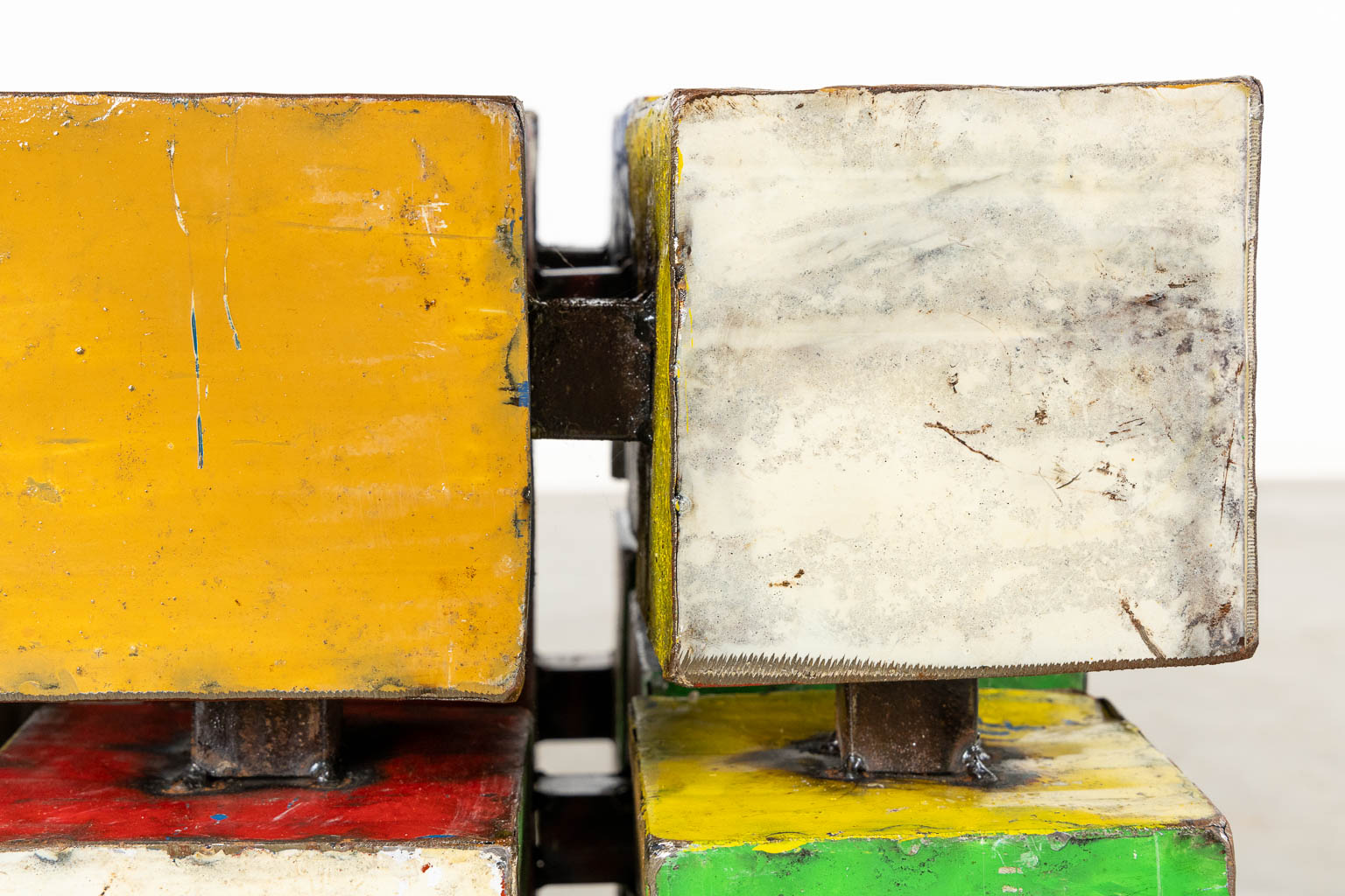 A mid-century side table in the shape of a Rubik's Cube 