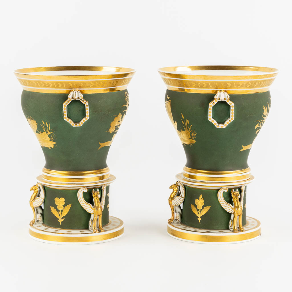 Fleury à Paris, a pair of porcelain cache-pots, Empire. 19th C. (H:27 x D:21 cm)