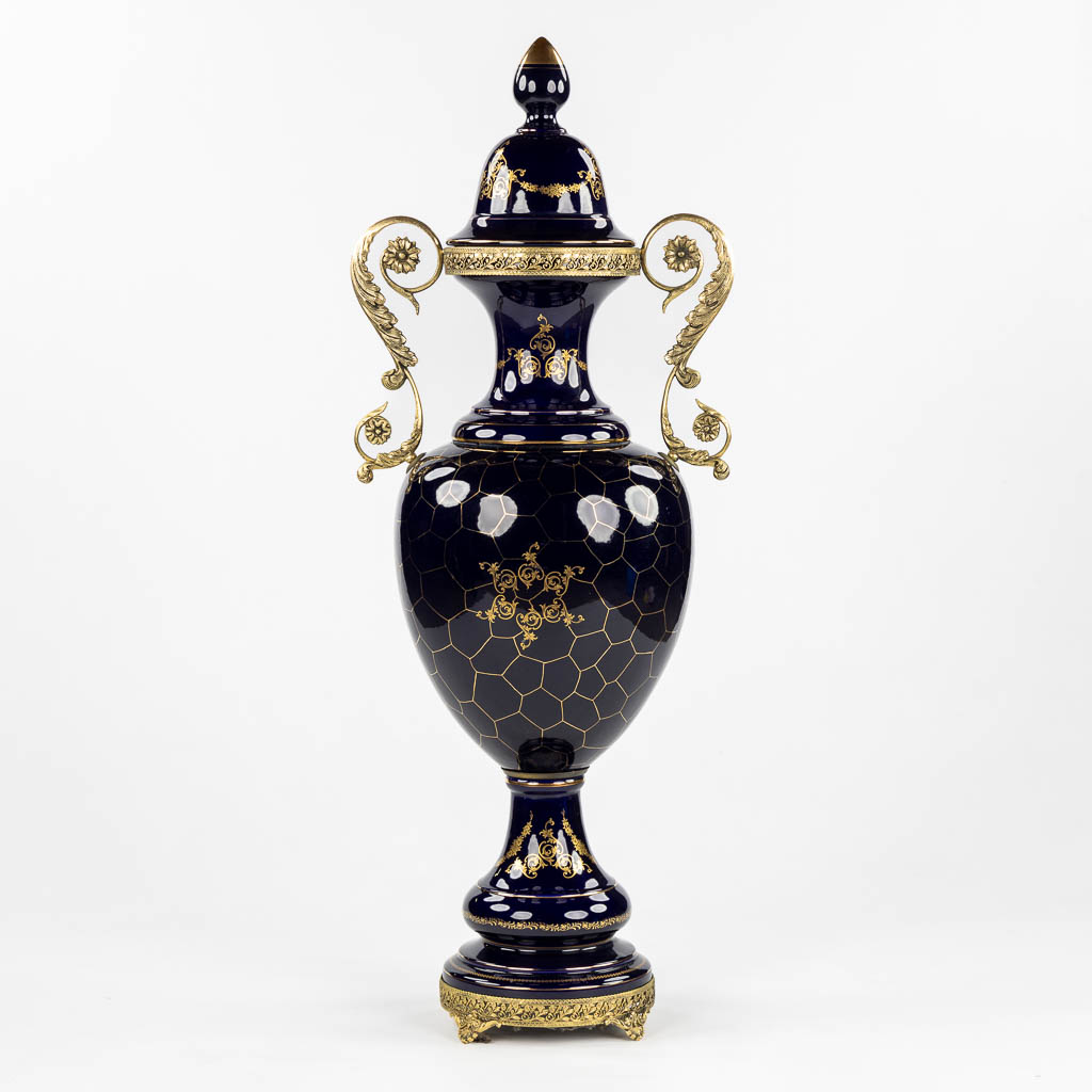 A decorative cobalt blue vase mounted with bronze, in the style of Sèvres. 20th C. (L:30 x W:42 x H:110 cm)