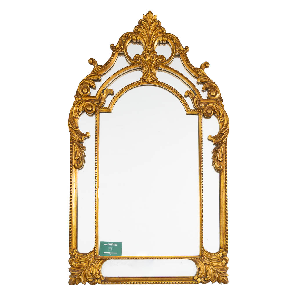 Deknudt, a decorative mirror in a Louis XV style. (W:65 x H:110 cm)