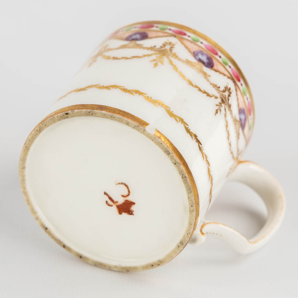 Various pieces of Vieux Bruxelles and Vieux Paris porcelain, mostly with gilt. 18th and 19th C. (H:18,5 cm)