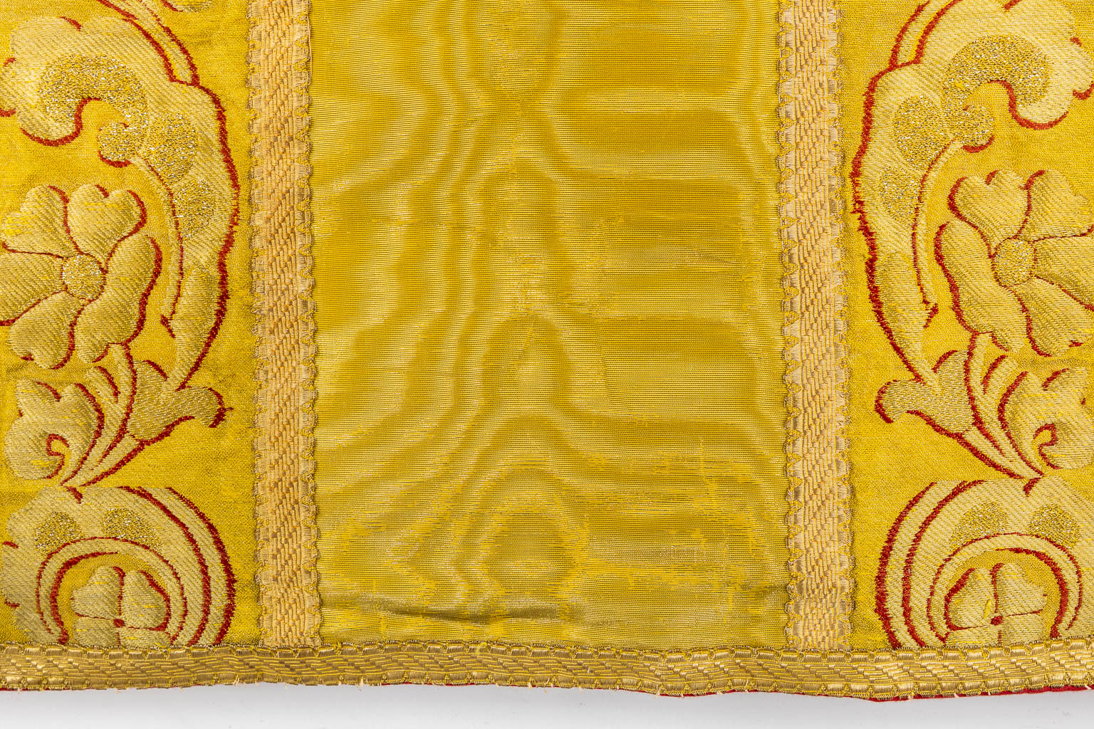 A Cope, a pair of Dalmatics and Two Roman Chasubles, Embroideries.