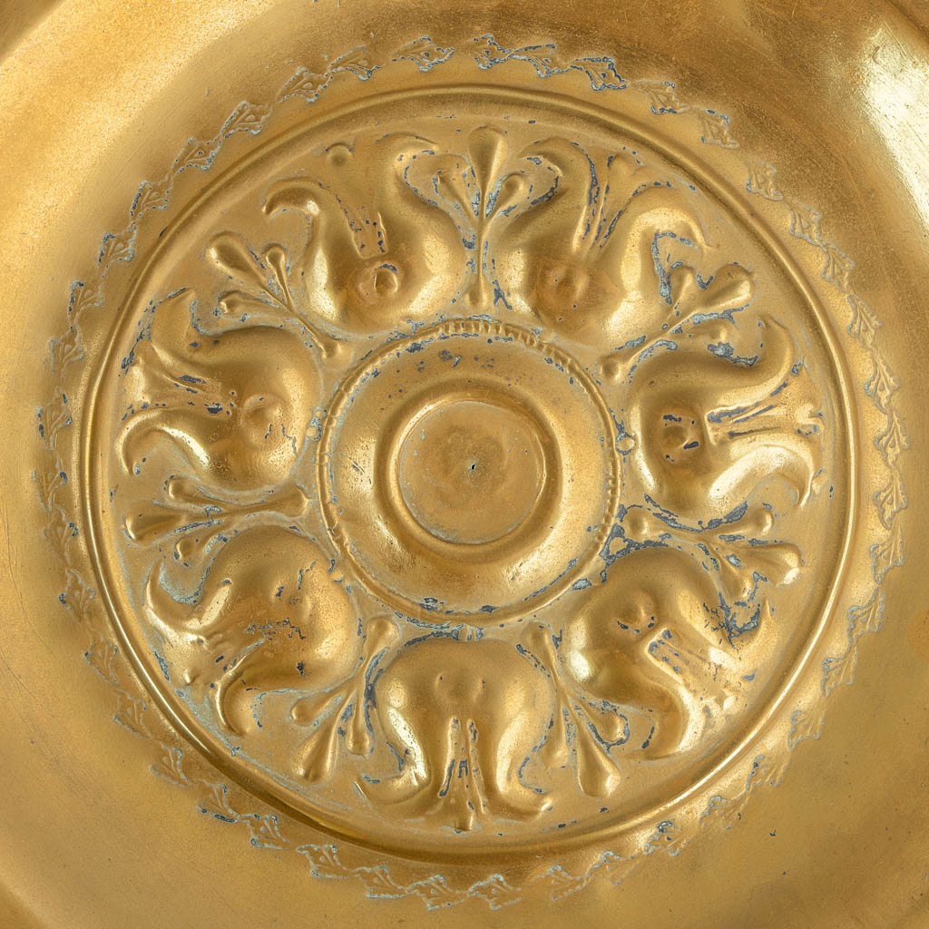 A brass Alms Dish depicting 