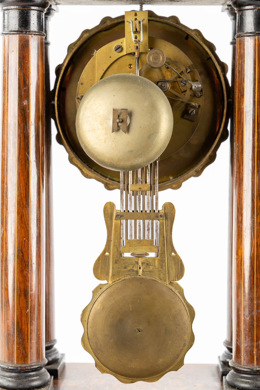 A column clock, marquetry inlay and gilt bronze. 19th C. (L:15 x W:25 x H:46 cm)