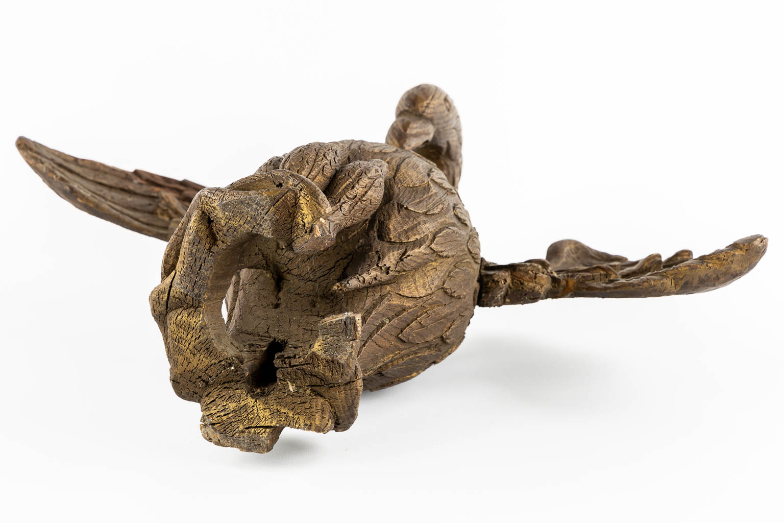 An antique wood-sculptured 'Pelican With Chicks'. 18th/19th C.