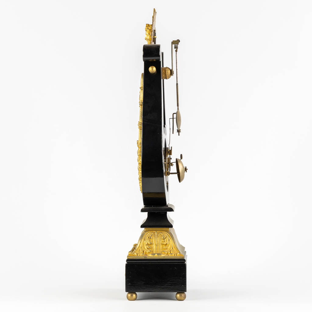 A Lyre mantle clock, gilt bronze and marble. 19th C. (L:13 x W:22 x H:61 cm)