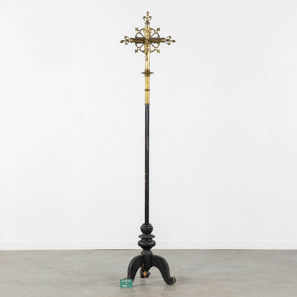 Four Processional crucifixes with their stands. Silver-plated metal and Brass. (H:265 cm)