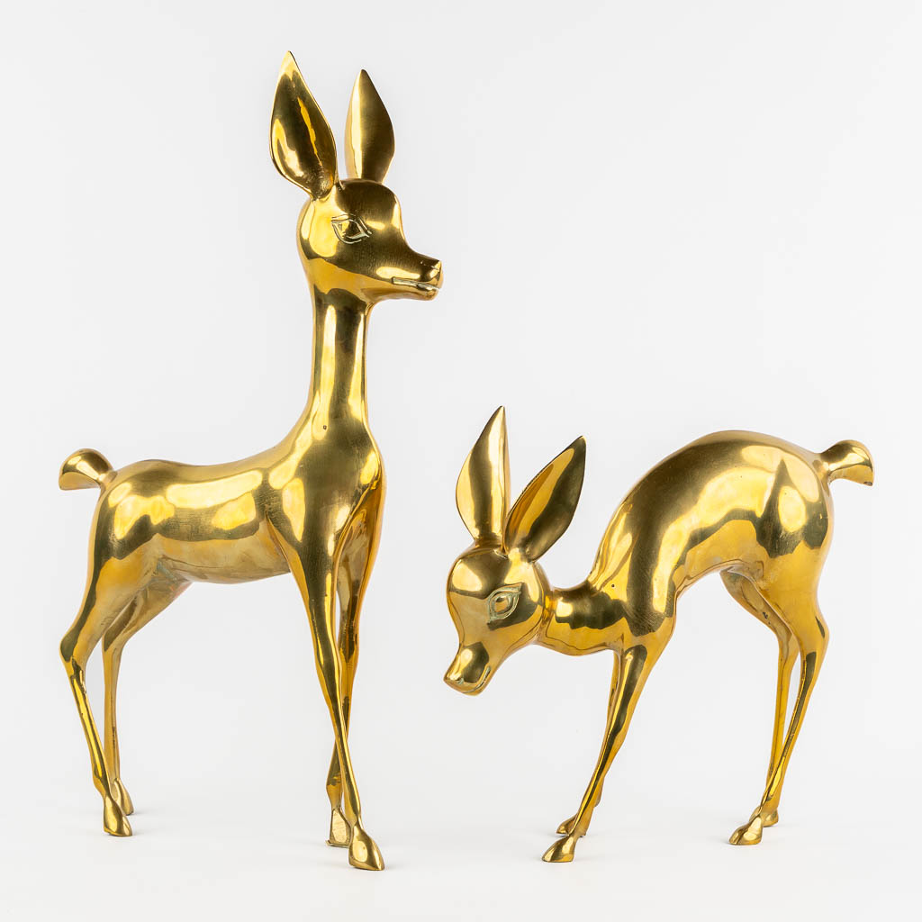 A pair of brass deer, Hollywood Regency style. (W:56 x H:33 cm)