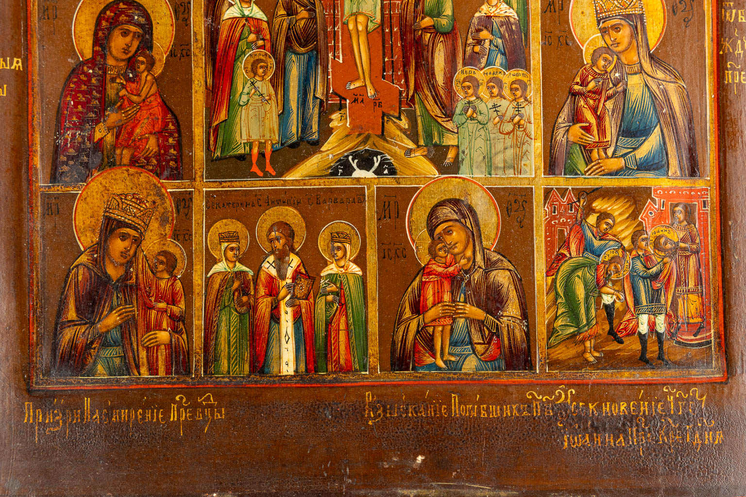 A large Russian icon with various scènes, Mother Gods, Crucifixion. 19th C. (W:30,5 x H:36 cm)