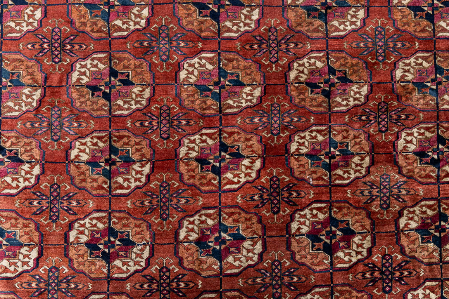 An Oriental hand-made carpet, Turkaman/Turkoman. (L:320 x W:201 cm)