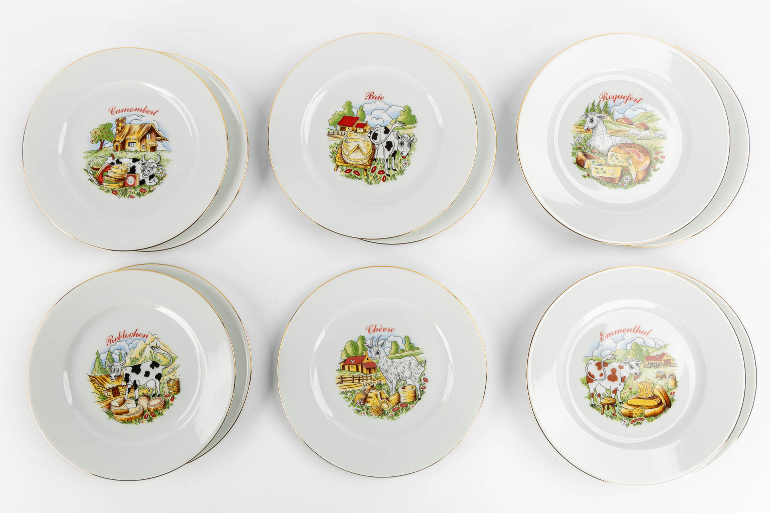 Limoges, a collection of fish-, cheese- and dinner plates. Porcelain. (L:31 x W:39 cm)