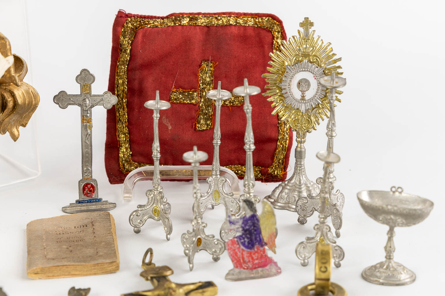 A large collection of Deovionalia, holy water fonts, monstrances and reliquaries. 