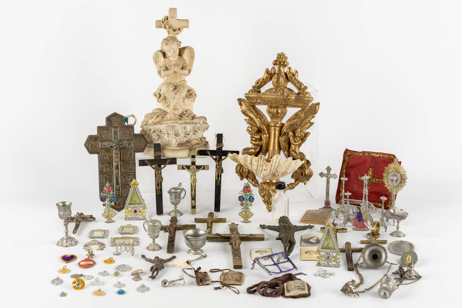 A large collection of Deovionalia, holy water fonts, monstrances and reliquaries. 