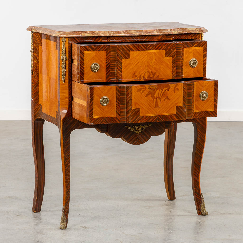 A two drawer side cabinet, marquetry inlay with a marble top. (L:39 x W:72 x H:81 cm)