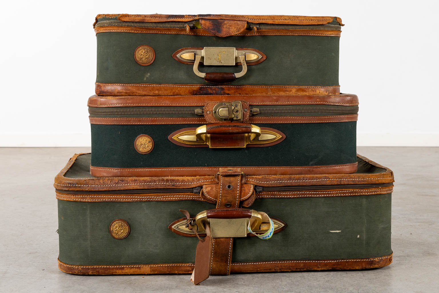 Delvaux, three travellers suitcases. (W:76 x H:52 cm)