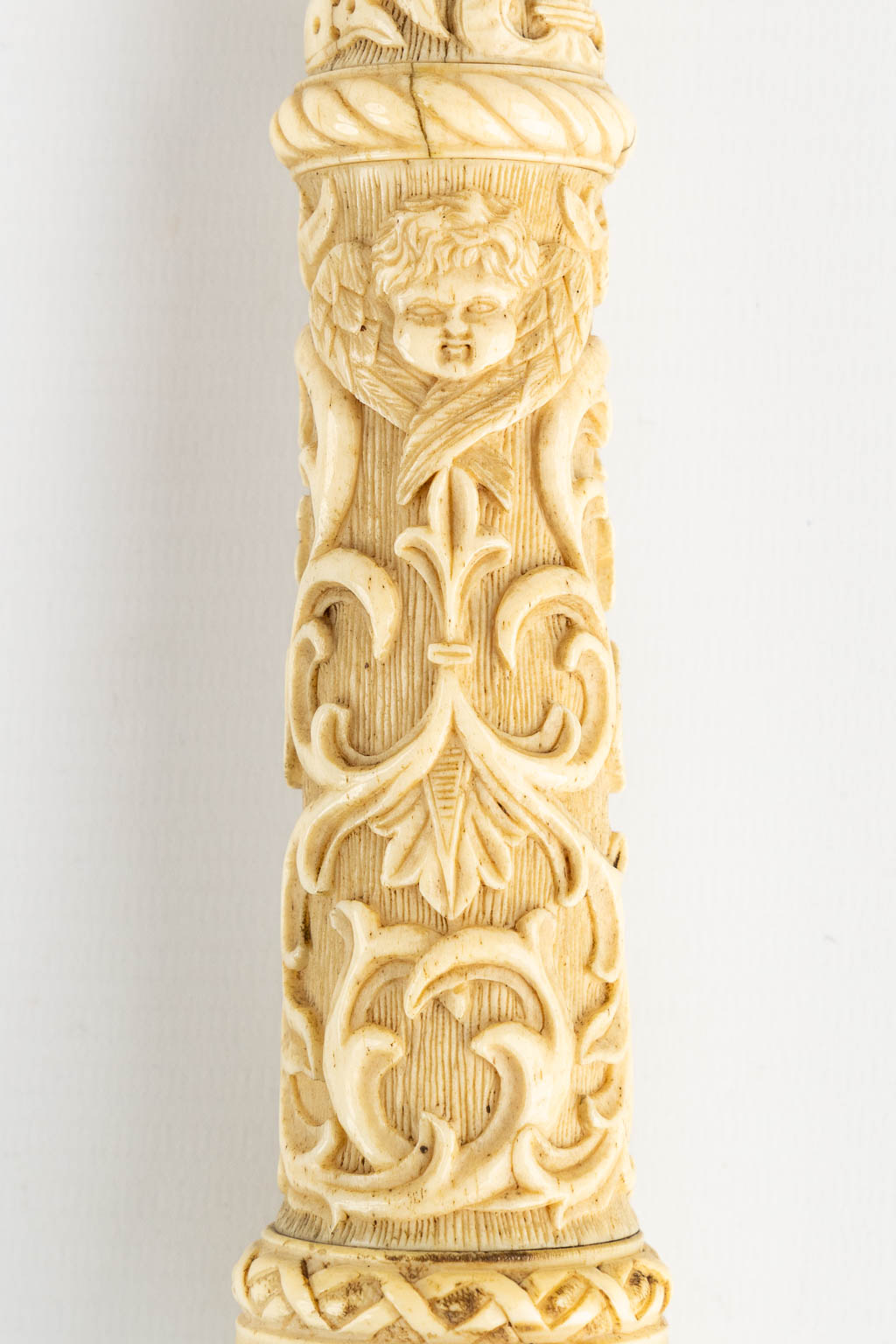 A sculptured ivory sceptre, sculptured mythological figurines. 19th C. (L:63 cm)