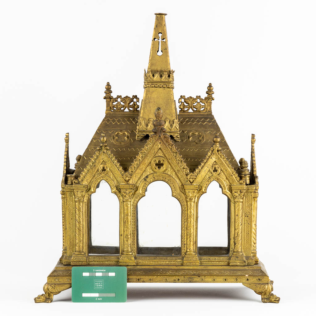 A Reliquary Shrine shaped like a Gothic Revival chapel, gilt bronze.