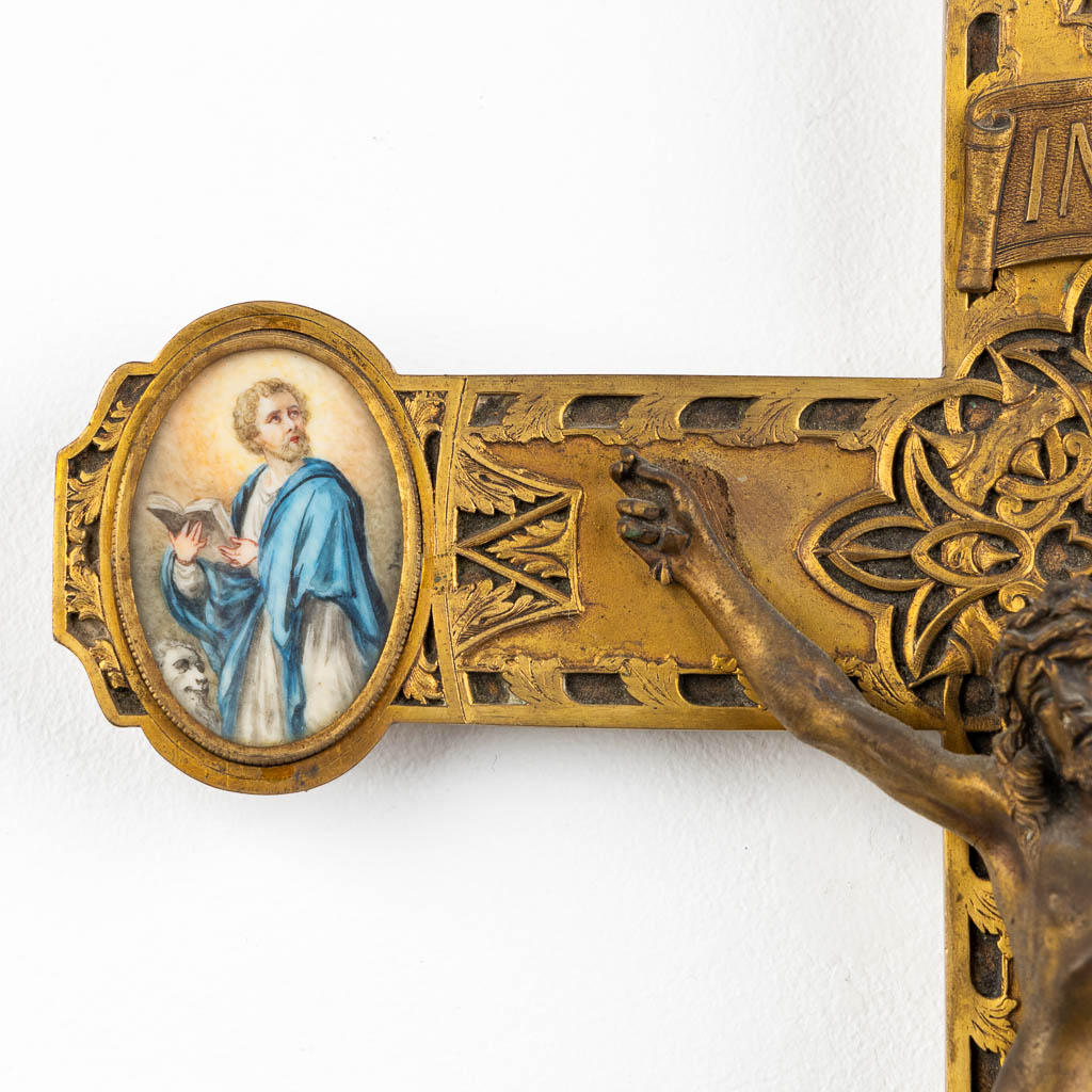 A crucifix, finely chiselled brass with 4 miniature paintings of 'The Four Evanglists'. 