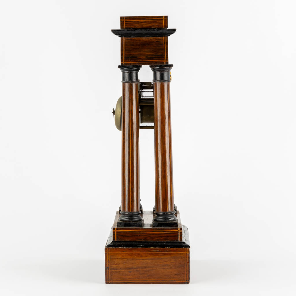 A column clock, marquetry inlay and gilt bronze. 19th C. (L:15 x W:25 x H:46 cm)