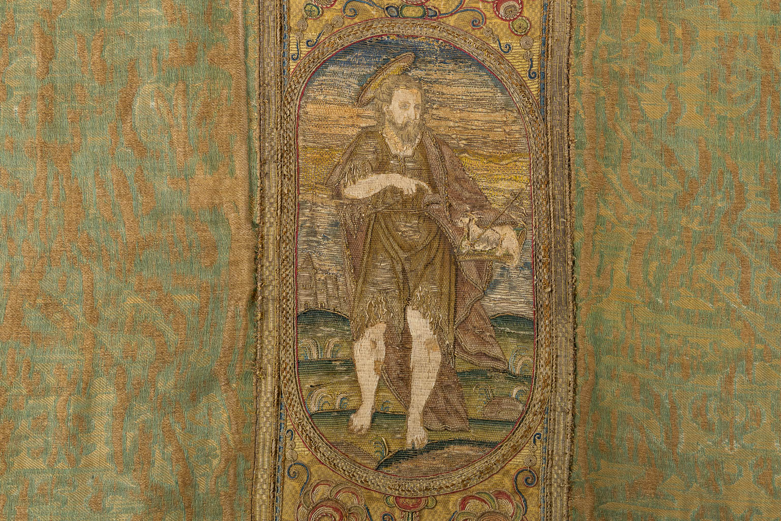 An antique fragment of a Roman Chasuble, Saint John The Baptist, Flanders, 16th C. (W:74 x H:140 cm)