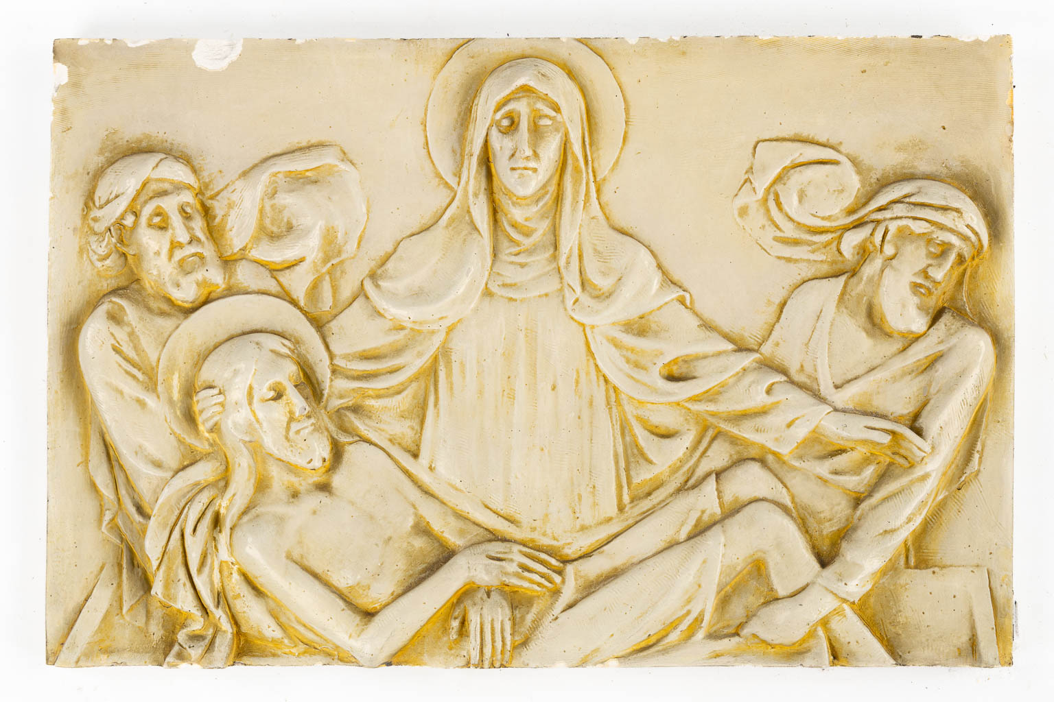 A 14-piece Station of the Cross, patinated plastser. (W:60 x H:39 cm)