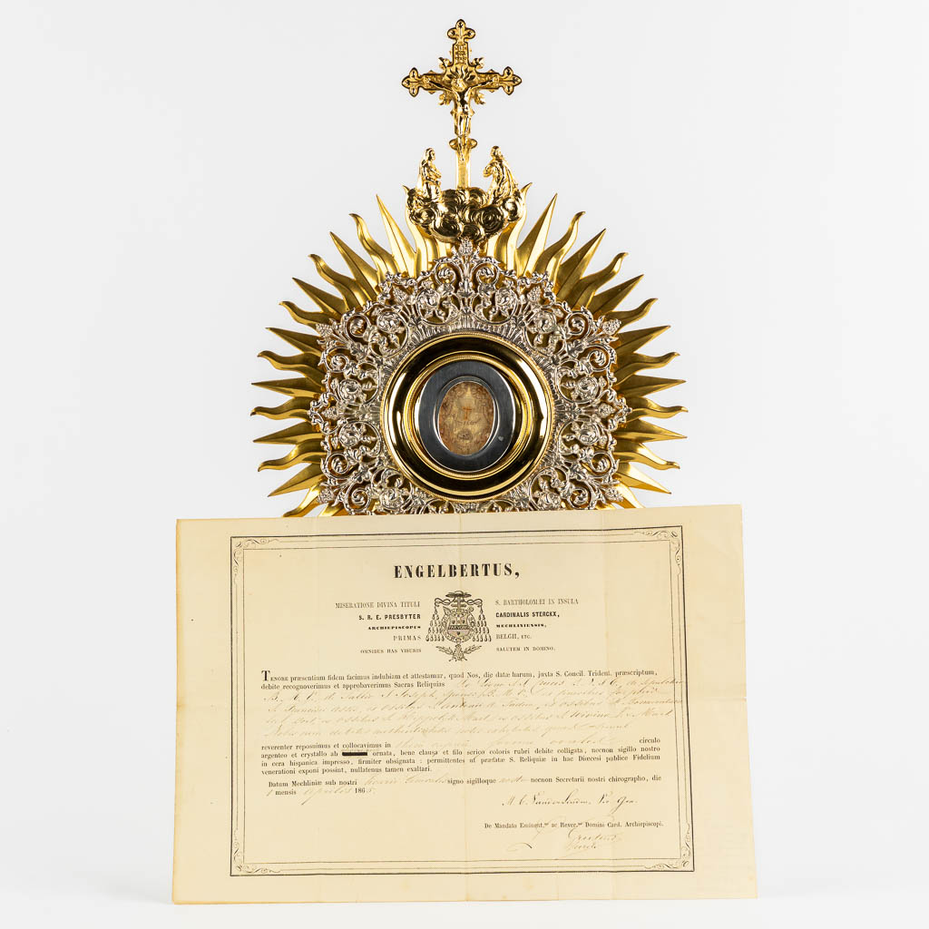 A sunburst monstrance with a multi-theca 