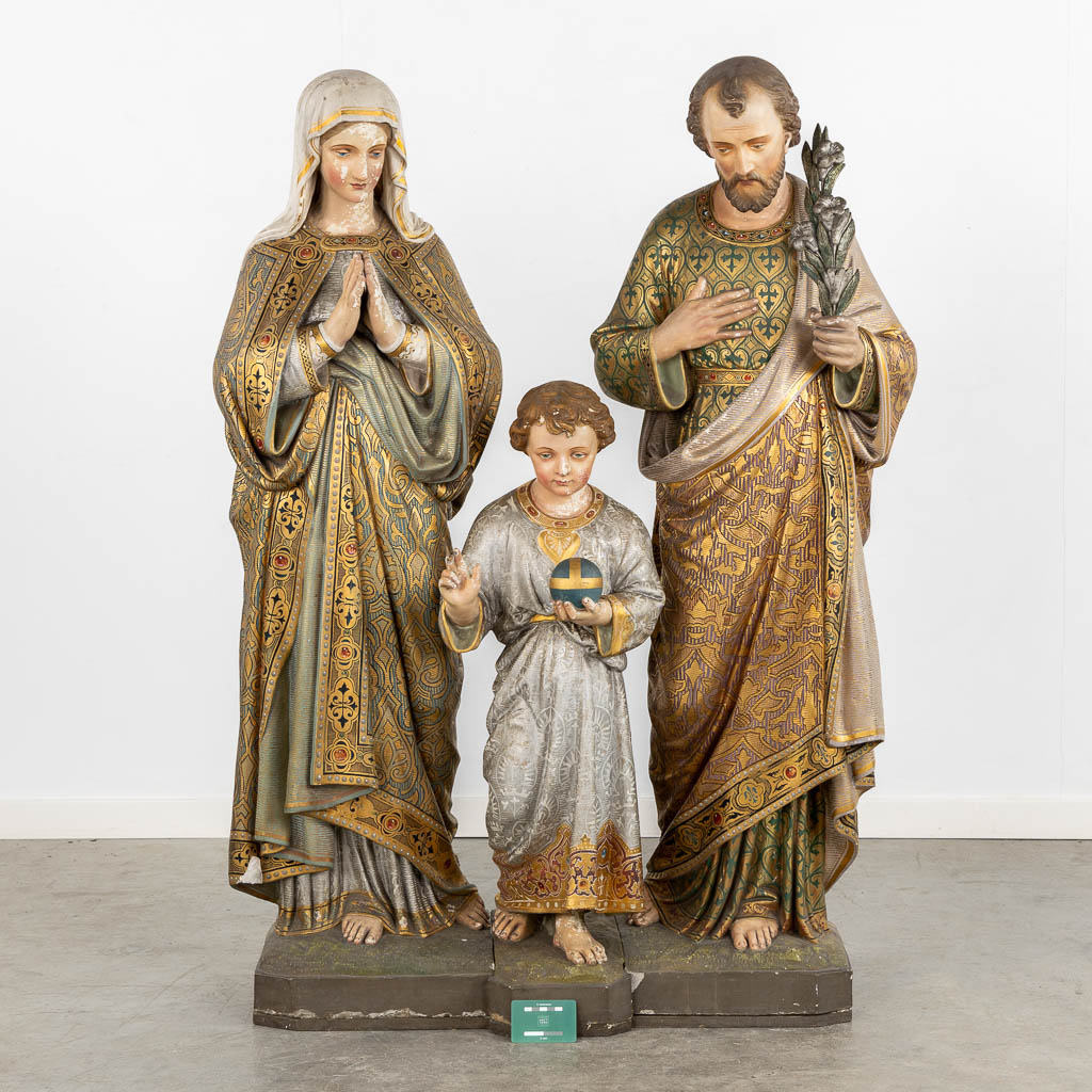 A set of three statues 