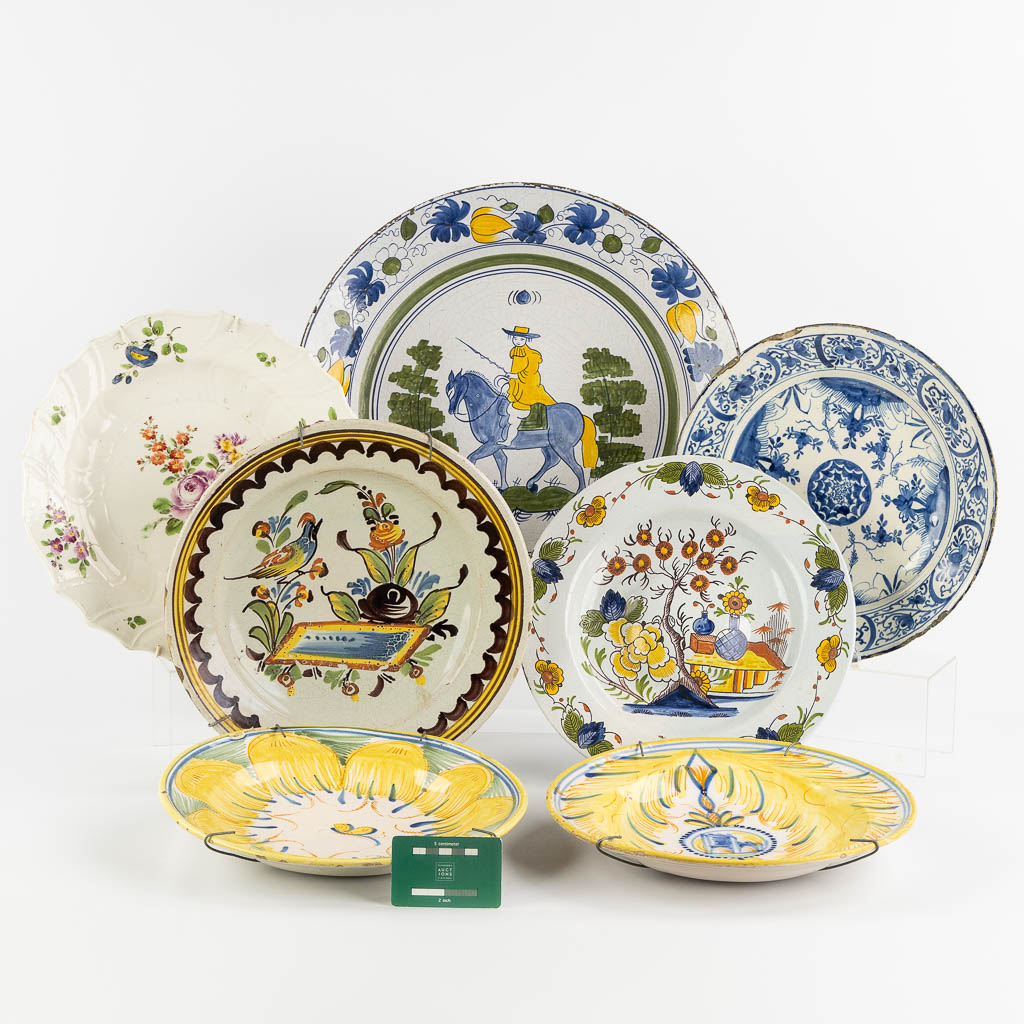 Seven Faience plates, France, 18th and 19th C. (D:42 cm)