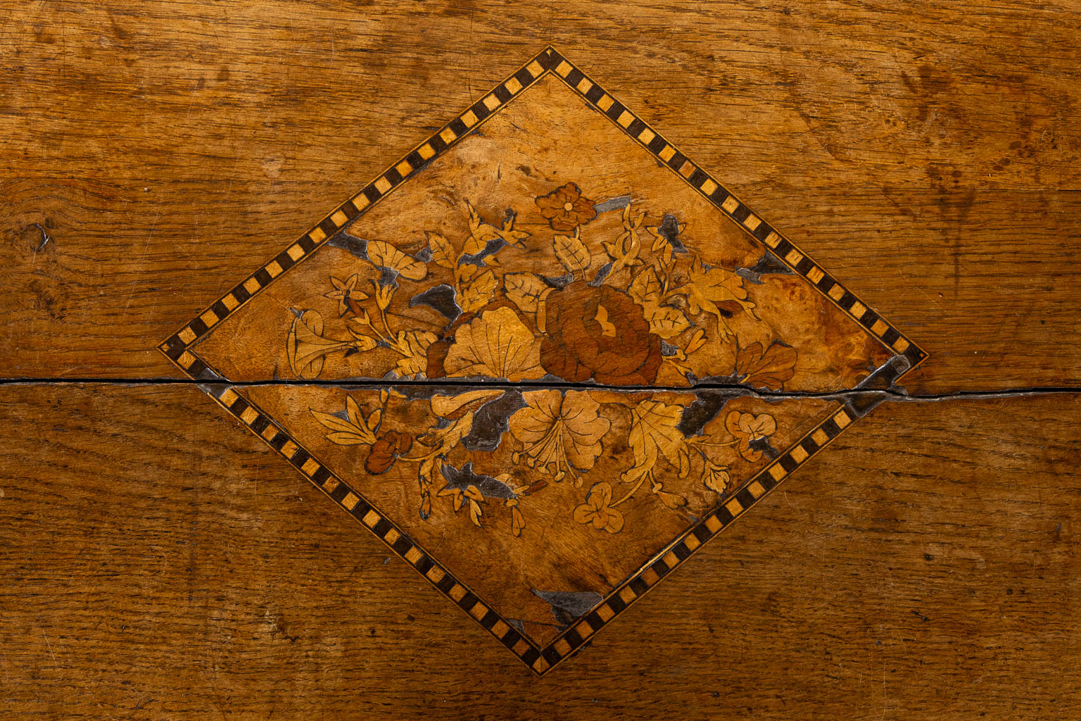 An antique chest with floral marquetry inlay, 18th C. (L:53 x W:124 x H:64 cm)