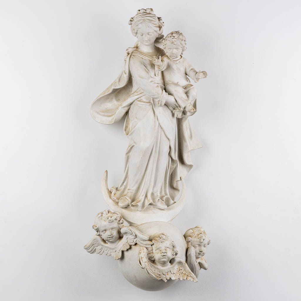 Madonna with a child, standing on a crescent moon, Baroque style. Circa 1900. (L:30 x W:42 x H:91 cm)