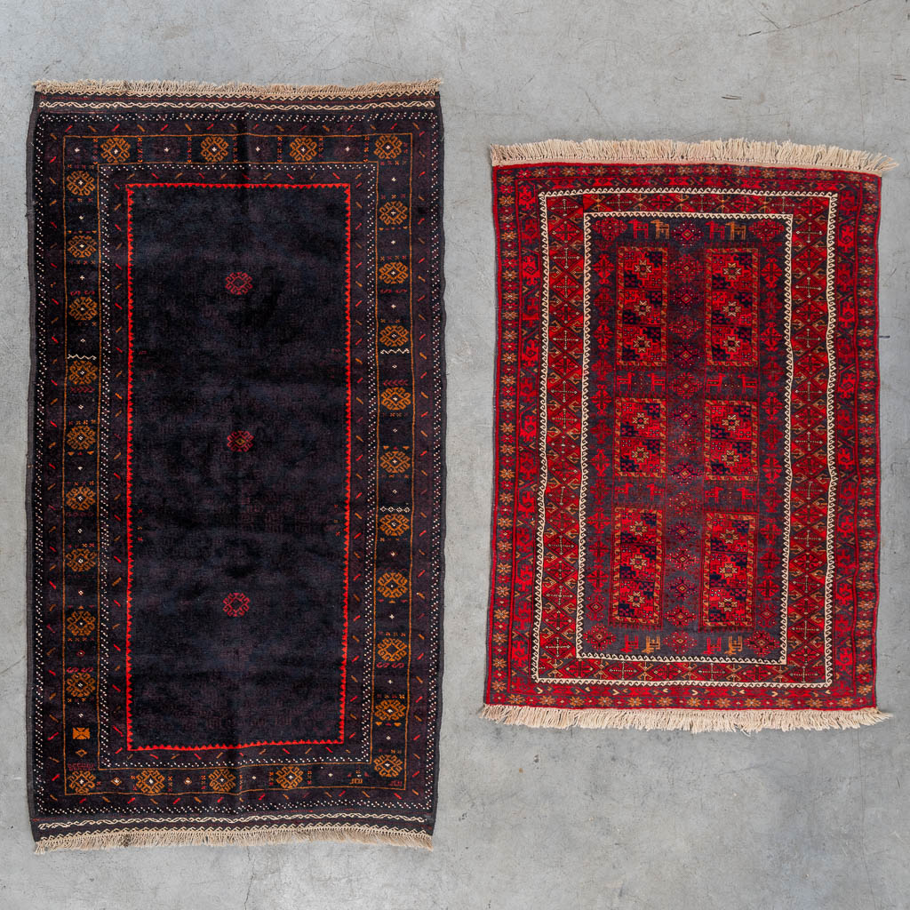 Two Oriental hand-made carpets, Afghan. (L:205 x W:119 cm)