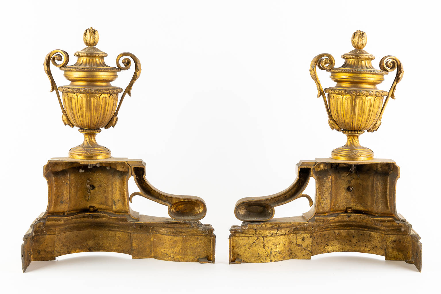 A fine pair of gilt bronze fireplace bucks, Louis XVI style. 19th C.