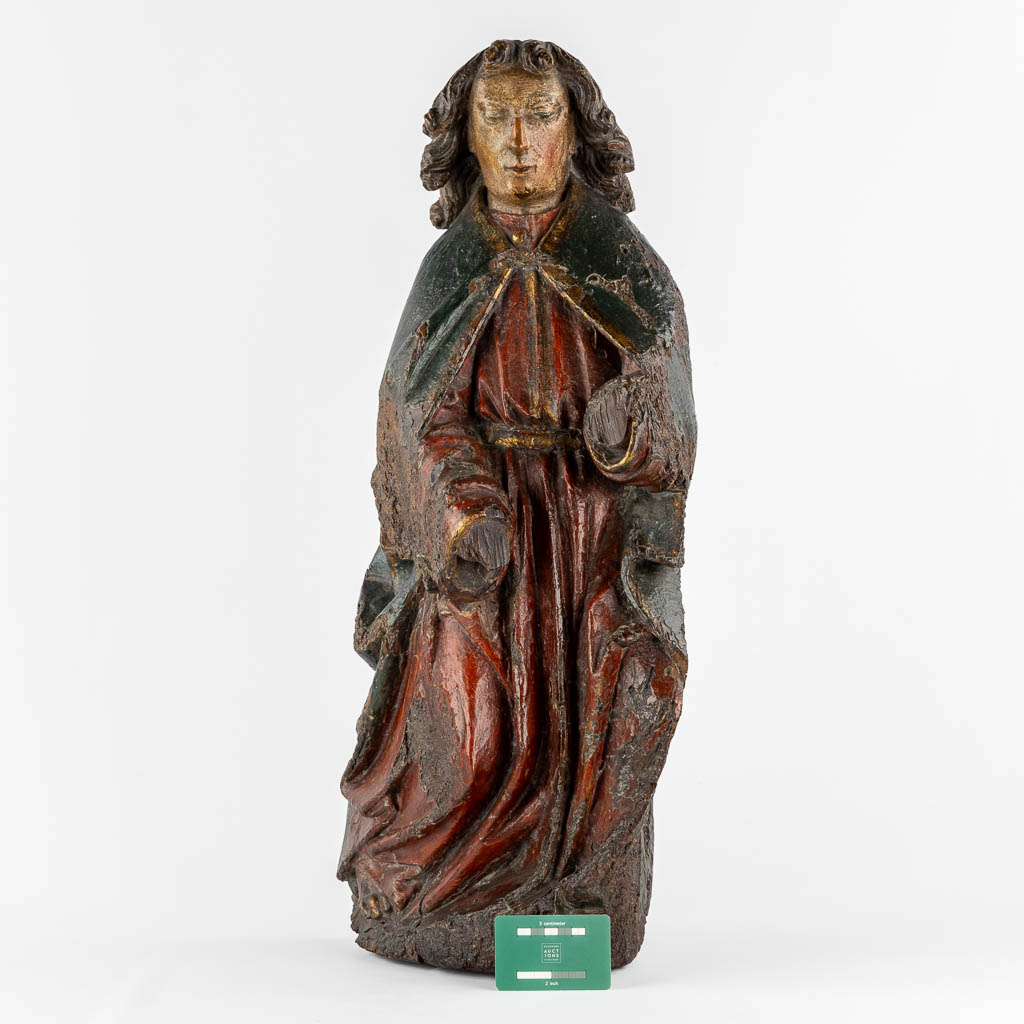 A large Gothic wood sculpture of an Angel, Rhineland, Germany, 14th/15th C.  (L:20 x W:36 x H:71 cm)