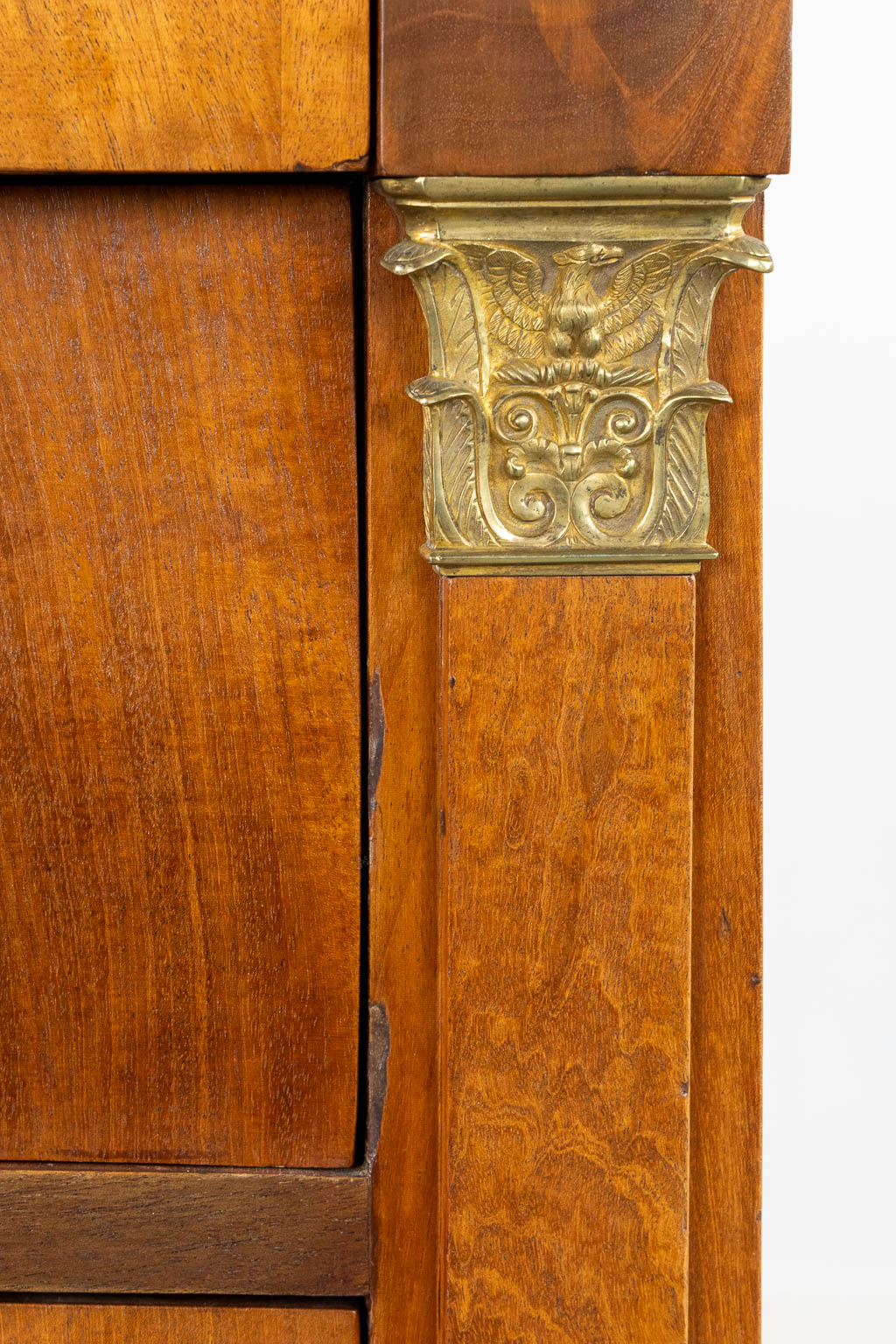 A four-drawer commode mounted with gilt bronze and a marble top, Empire. (L:53 x W:125 x H:98 cm)