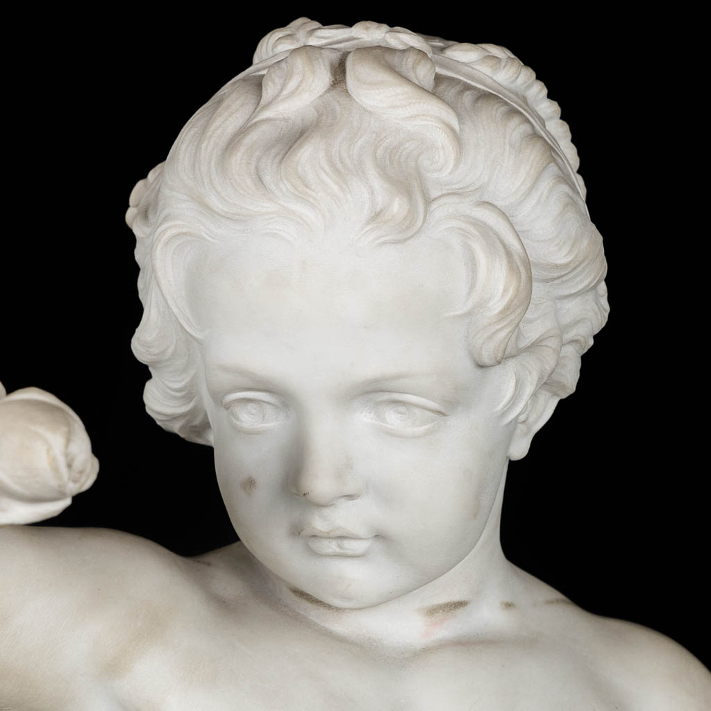 Boy with a rose, a Carrara marble sculpture, signed Vanet. 19th C. (L:35 x W:42 x H:92 cm)