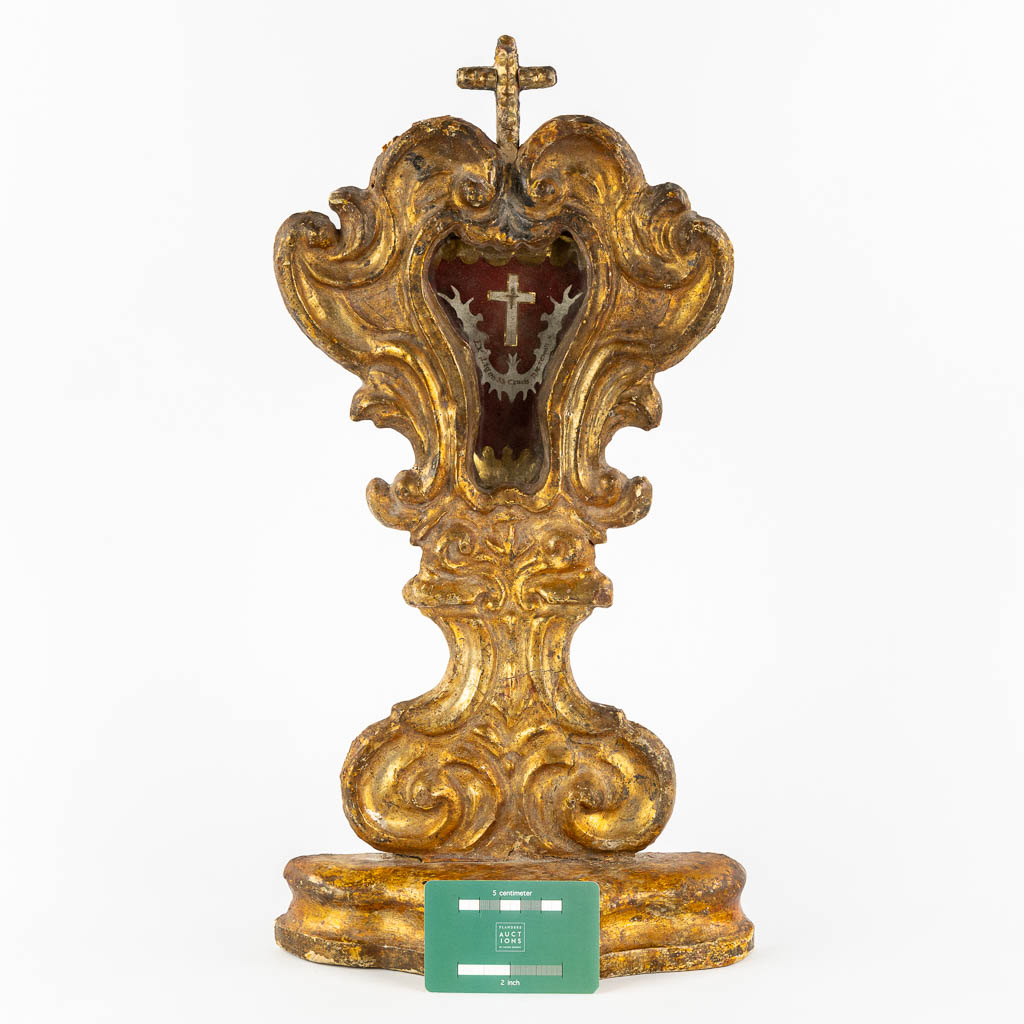 An antique wood-sculptured reliquary holder with a sealed relic of the true cross, Baroque, 18th C.