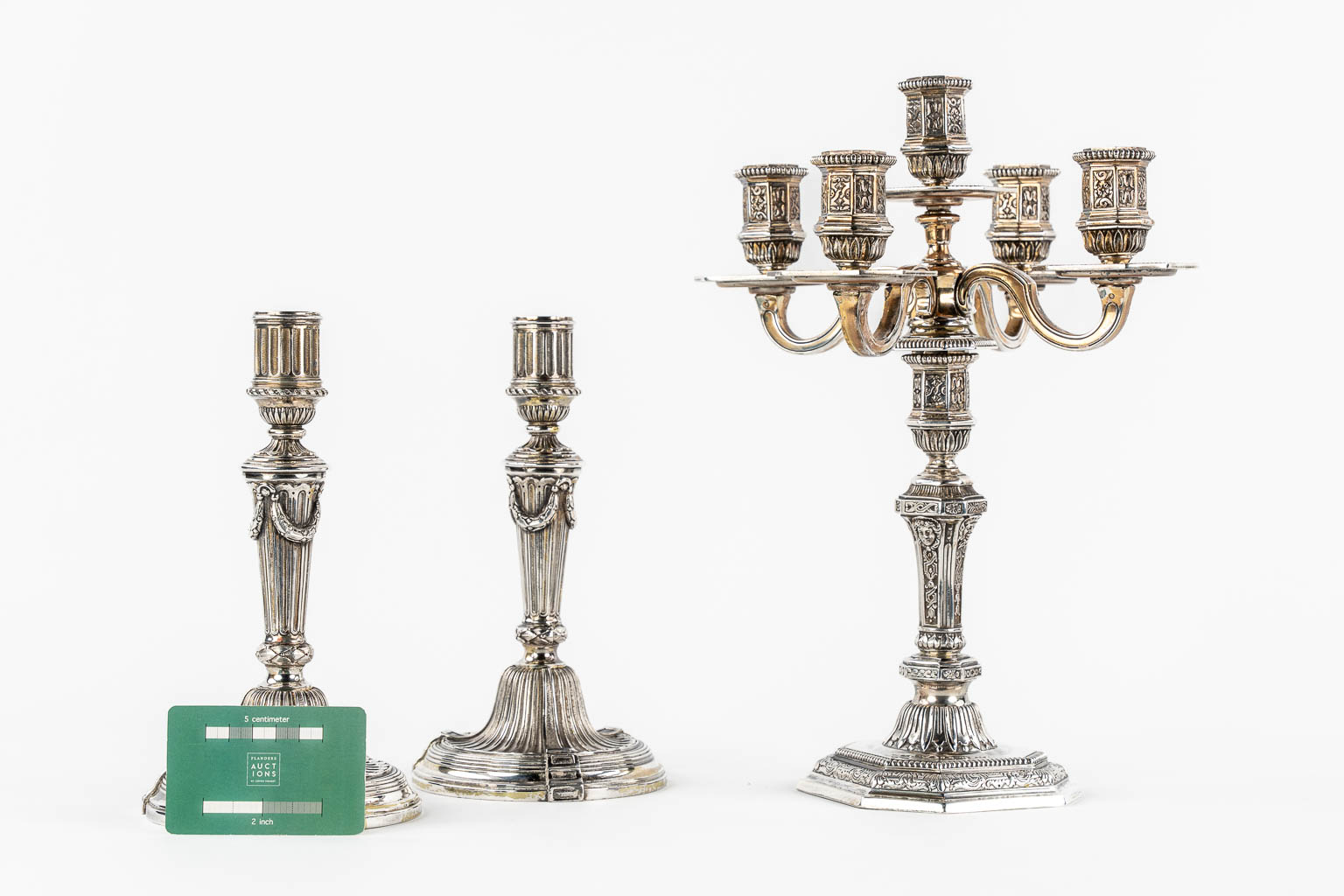 Christofle 'Duperier' a large candelabra, added are a pair of Candlesticks in Louis XVI style.