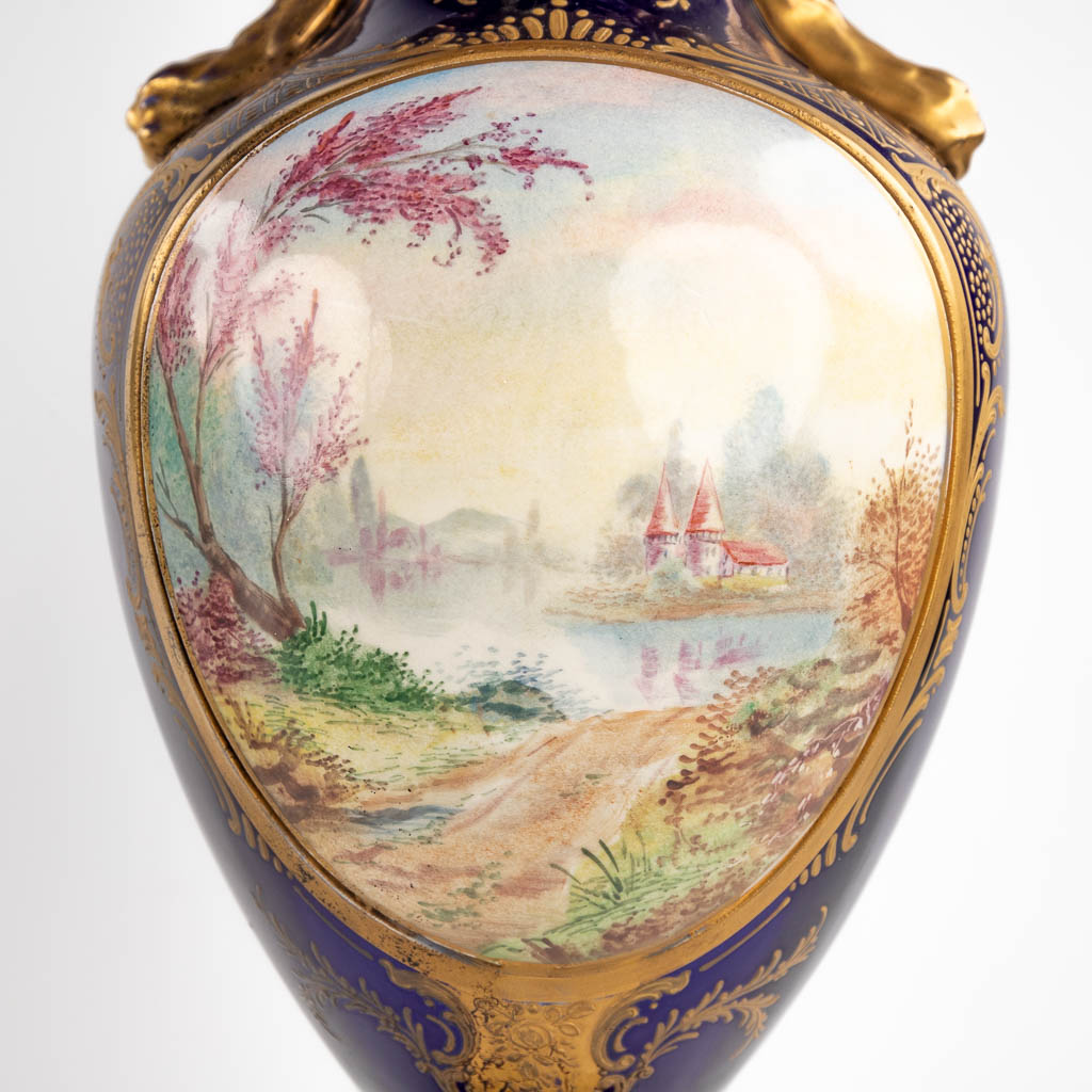 A pair of hand-painted and cobalt blue vases, J. Tiélès, Paris, France. (H:67 x D:20 cm)