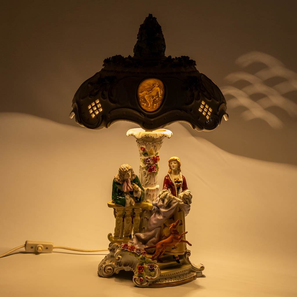 PMP, A polychrome porcelain table lamp, 20th C. (H:56 x D:34 cm)