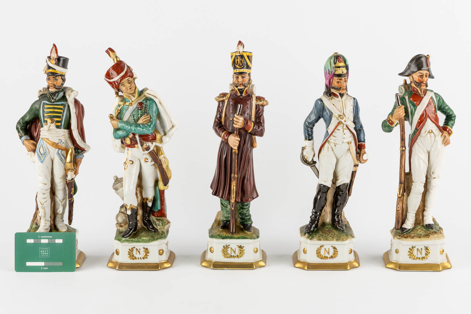 Napoleon and the generals, polychrome porcelain. 15 + 3 pieces. (L:9,5 x W:10 x H:31 cm)