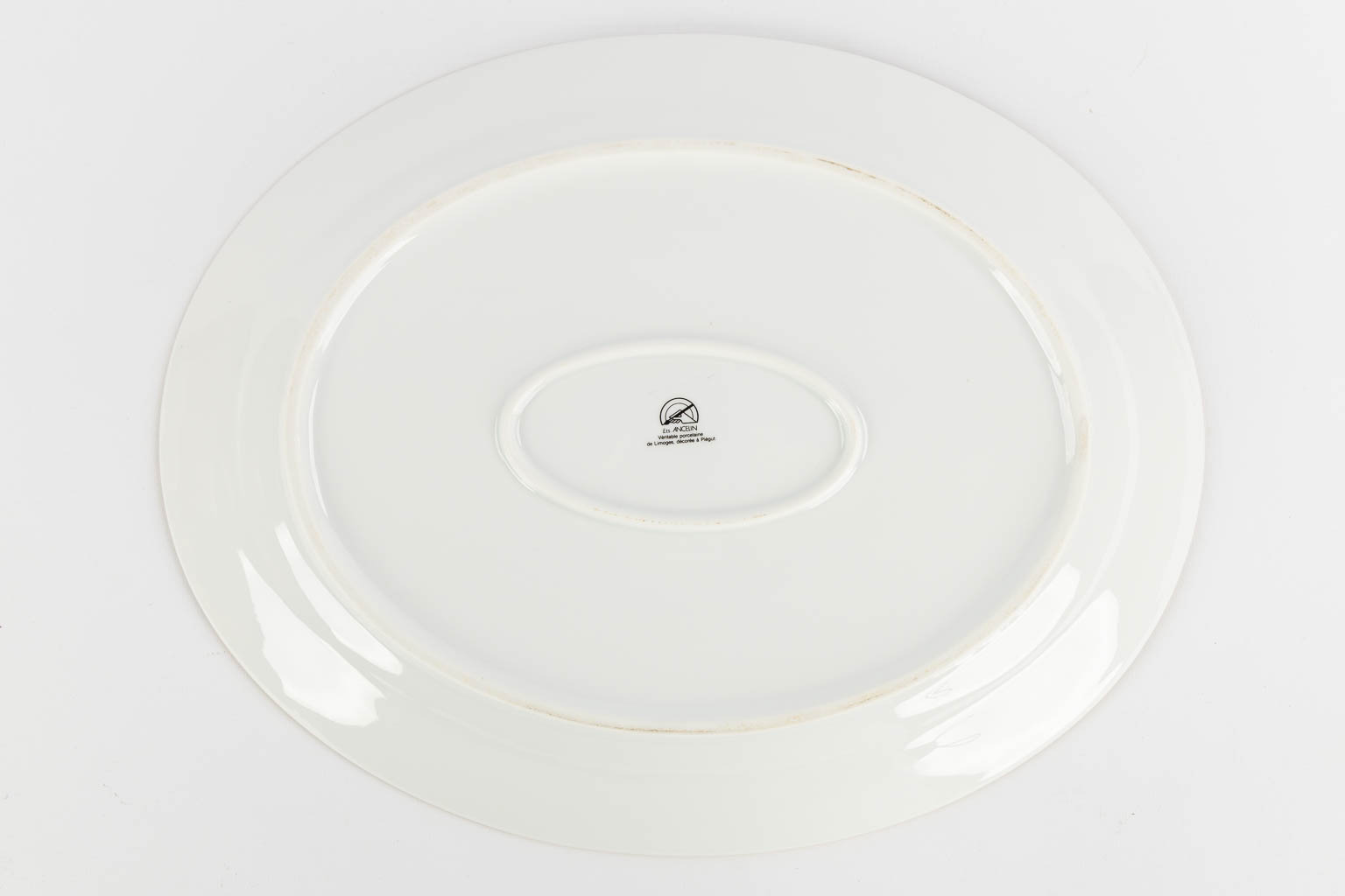 Limoges, a collection of fish-, cheese- and dinner plates. Porcelain. (L:31 x W:39 cm)