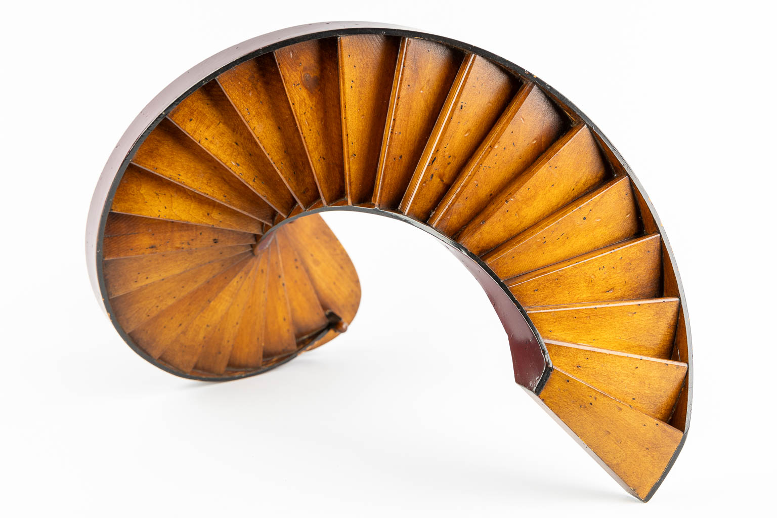 An architectural model of a revolving staircase, wood. 20th C. (H:47,5 x D:29 cm)