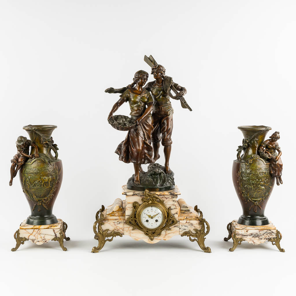 François MOREAU (1858-1931) 'La Pêche' a three-piece mantle garniture clock and side pieces. (W:48 x H:80 cm)